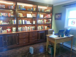 This bookshelf = an English major's dream! He's building me a writing desk to match.